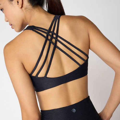 Black pull over sports bra, rear view of strap design across the back