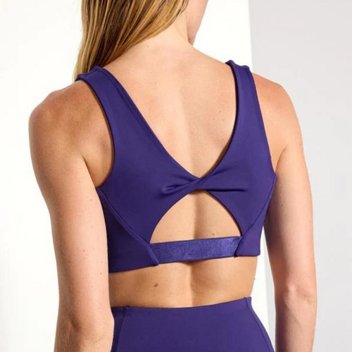 Pull over sports bra, purple, back view with cute twist  and cut out detail