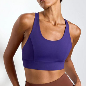 Front view of a purple pull over scoop neck sports bra